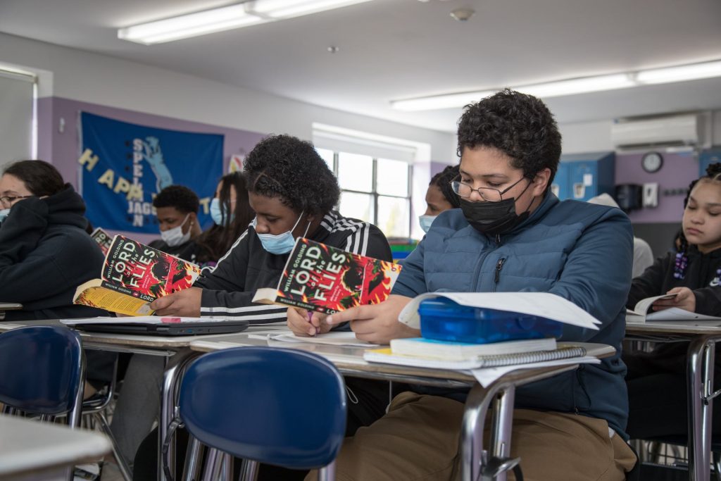 Students taking notes on Lord of the Flies