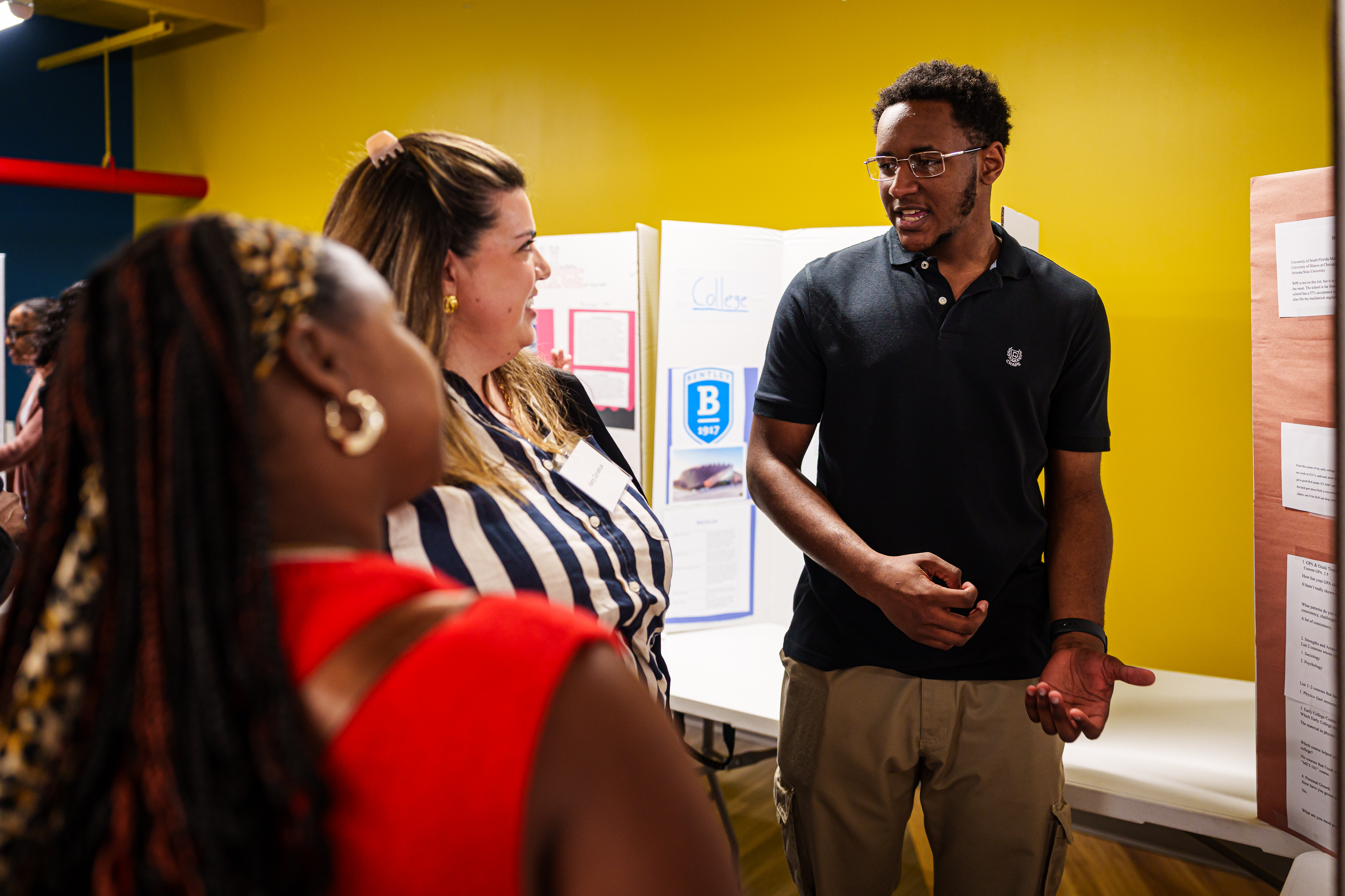Student writing on a white board